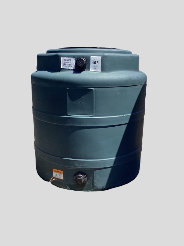 The image shows a green vertical water storage tank.
